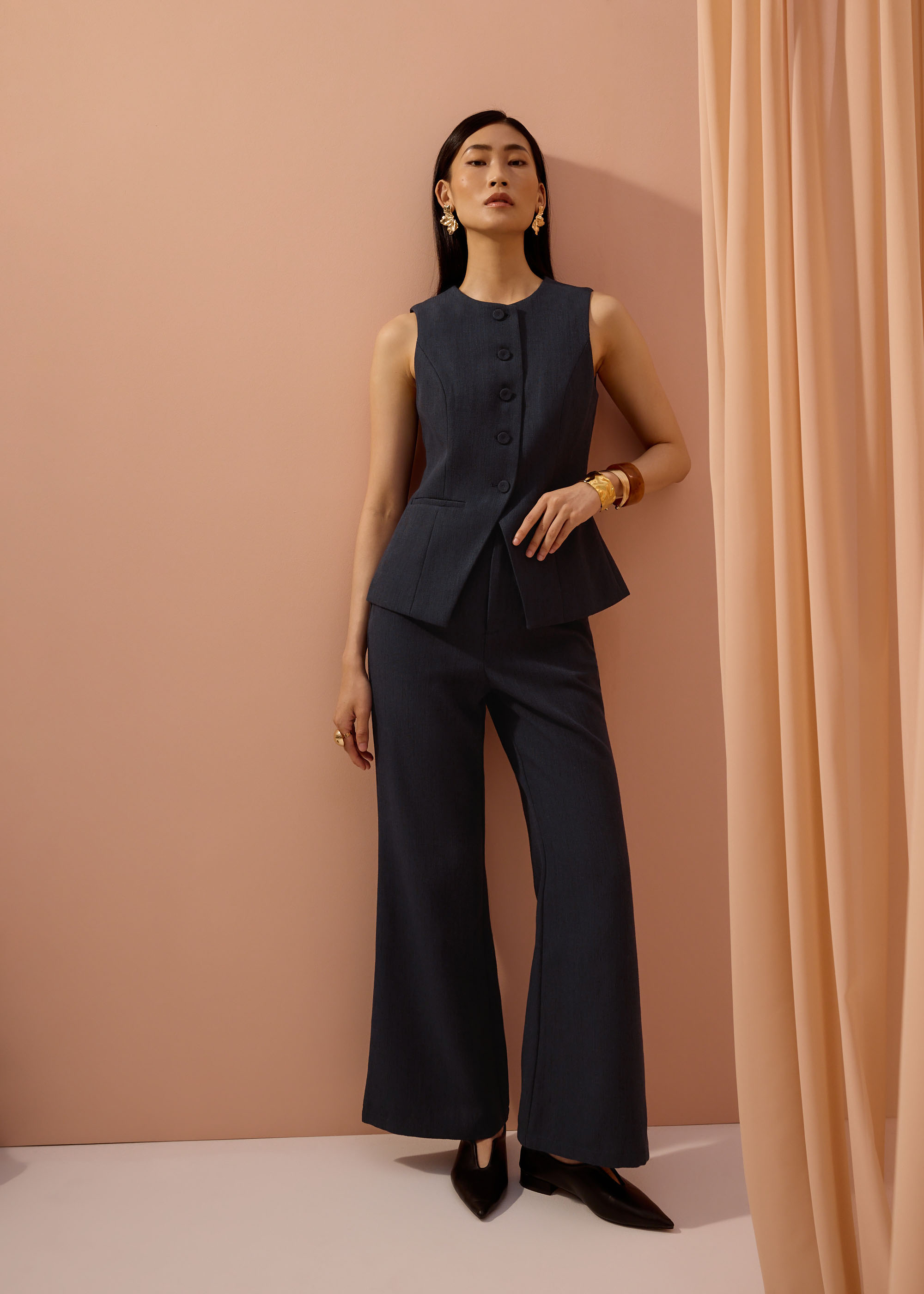

Padma Textured Round Neck Long Vest Top