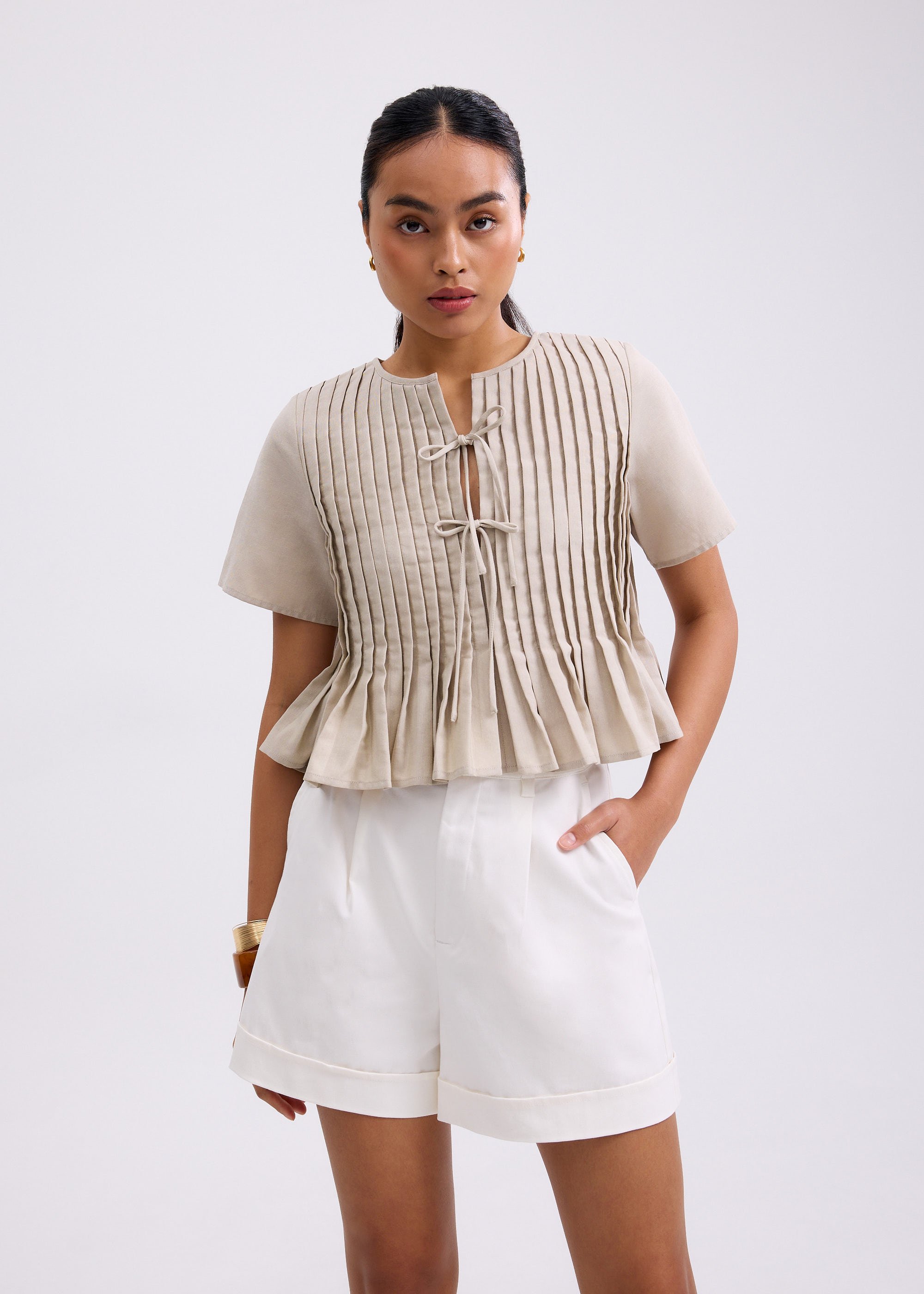 

Oxford Pintuck Notched Peplum Top Love, Bonito