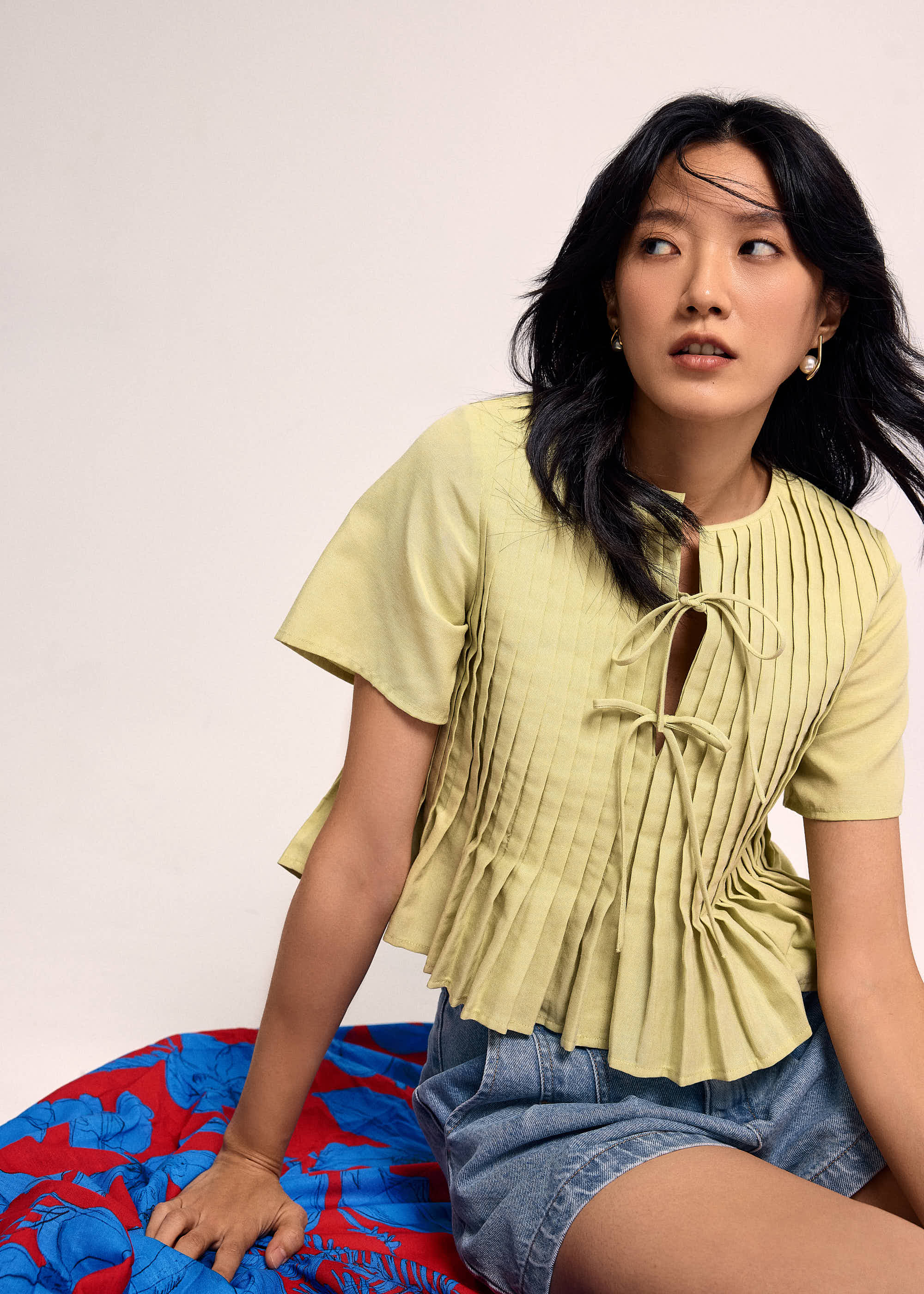 

Oxford Pintuck Notched Peplum Top